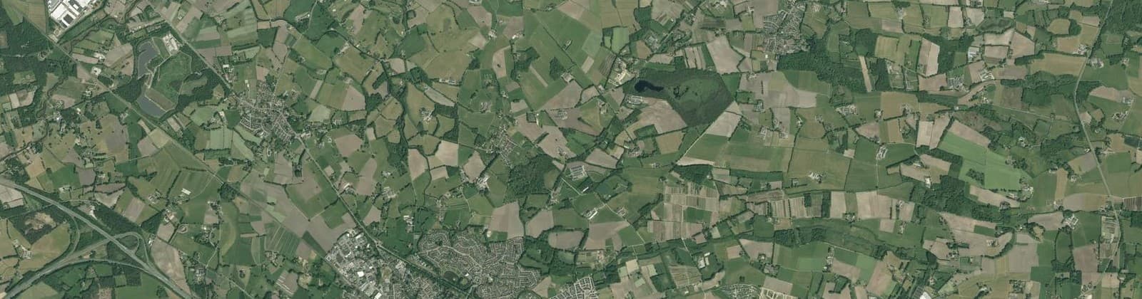 Luchtfoto van Verspreide huizen Hertme