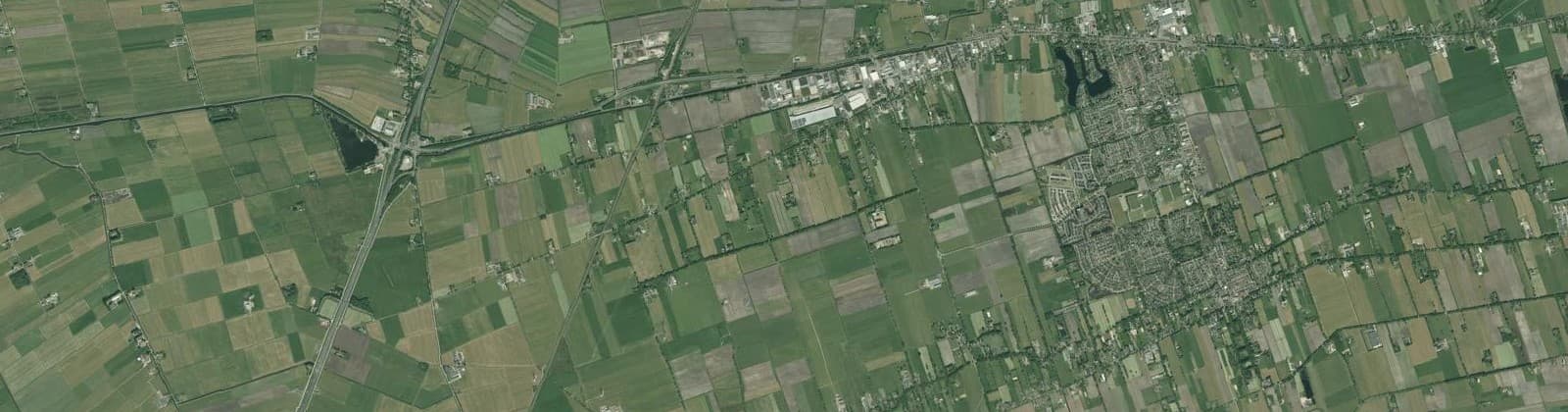 Luchtfoto van Verspreide huizen De Meele