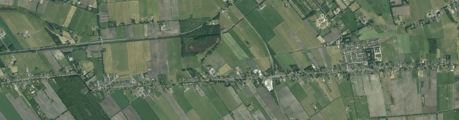 Luchtfoto van Verspreide huizen Lutten-West