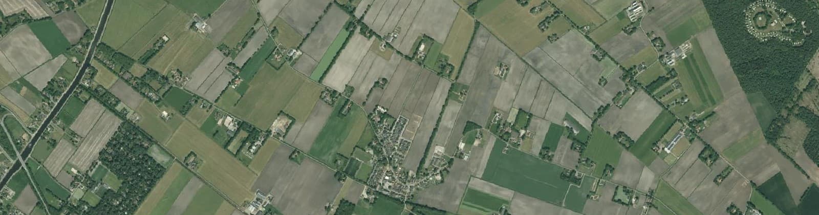Luchtfoto van Verspreide huizen Bruchterveld