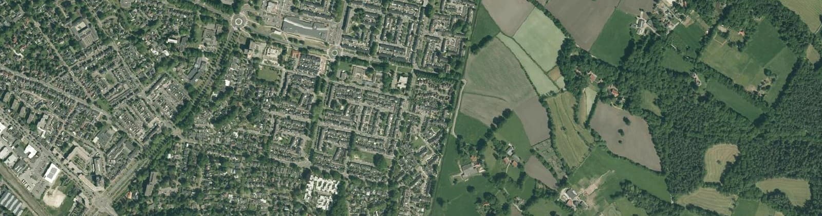 Luchtfoto van Verspreide huizen Driene