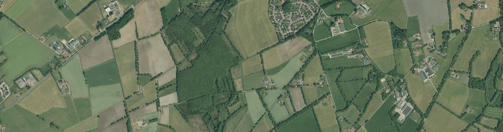 Luchtfoto van Verspreide huizen Reutum