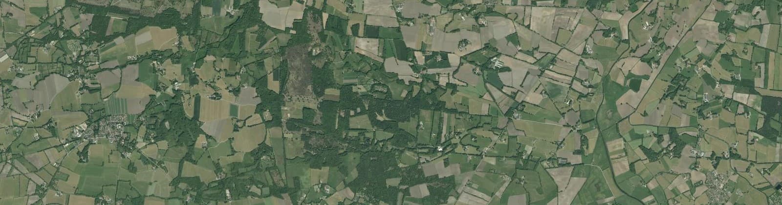 Luchtfoto van Verspreide huizen Hezingen