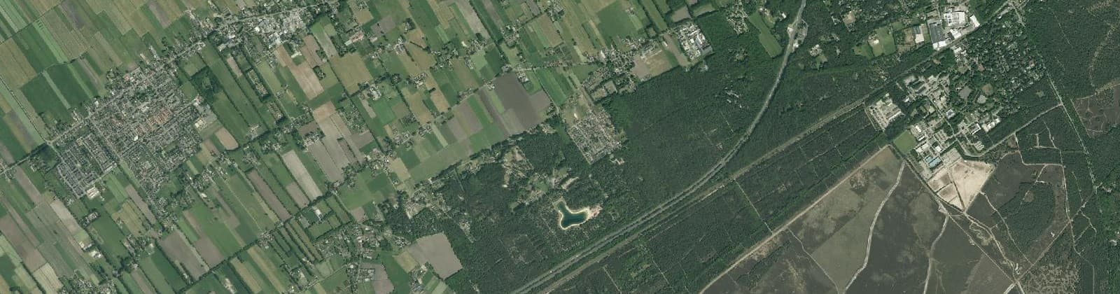 Luchtfoto van Verspreide huizen 't Loo