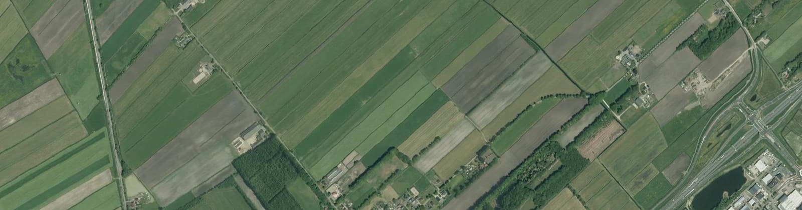 Luchtfoto van Verspreide huizen Duivendans