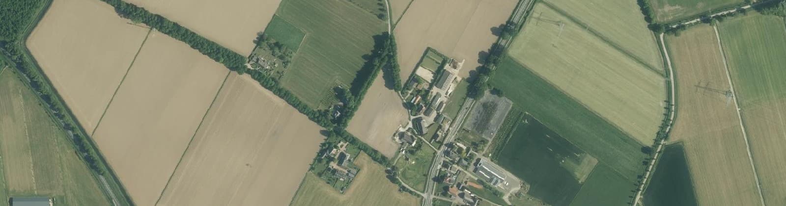 Luchtfoto van Verspreide huizen Lunen