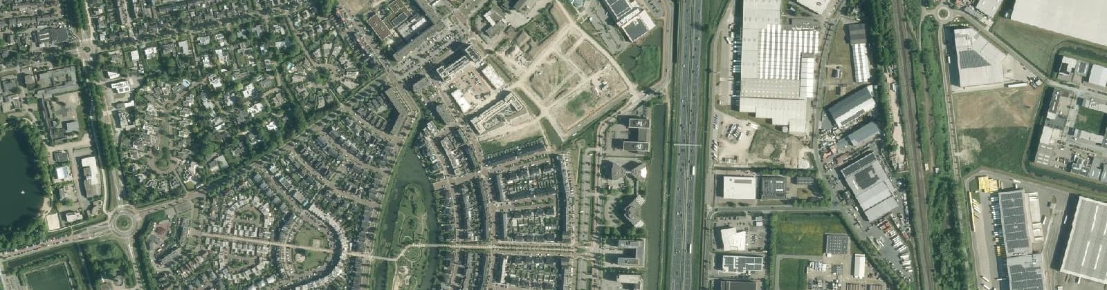 Luchtfoto van Verspreide huizen Hoeven