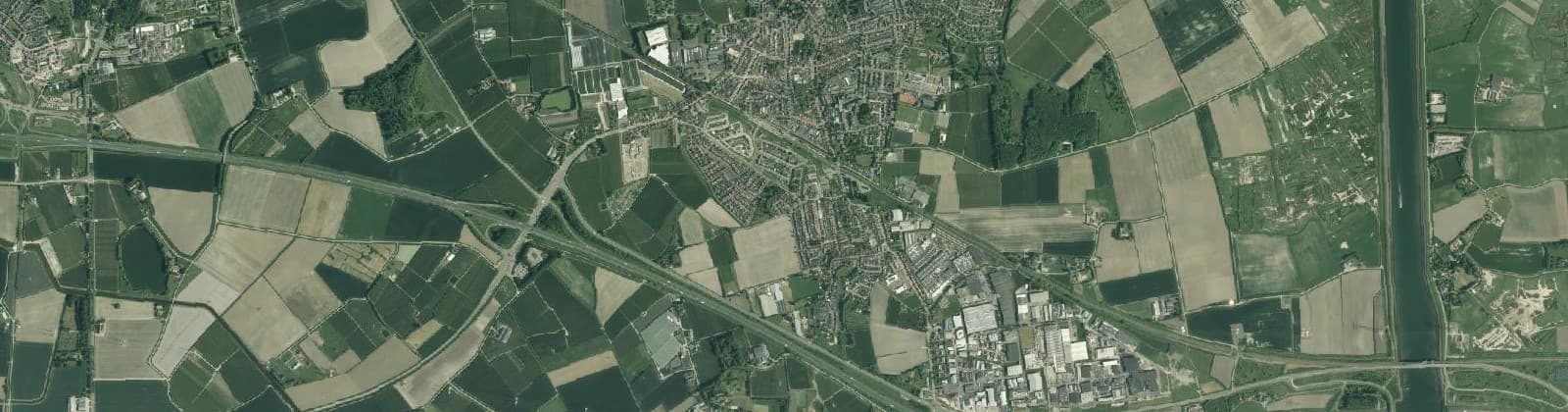 Luchtfoto van Verspreide huizen Kapelle