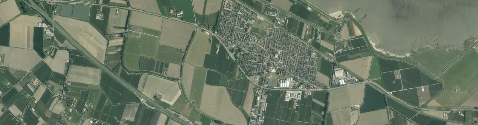 Luchtfoto van Verspreide huizen Krabbendijke