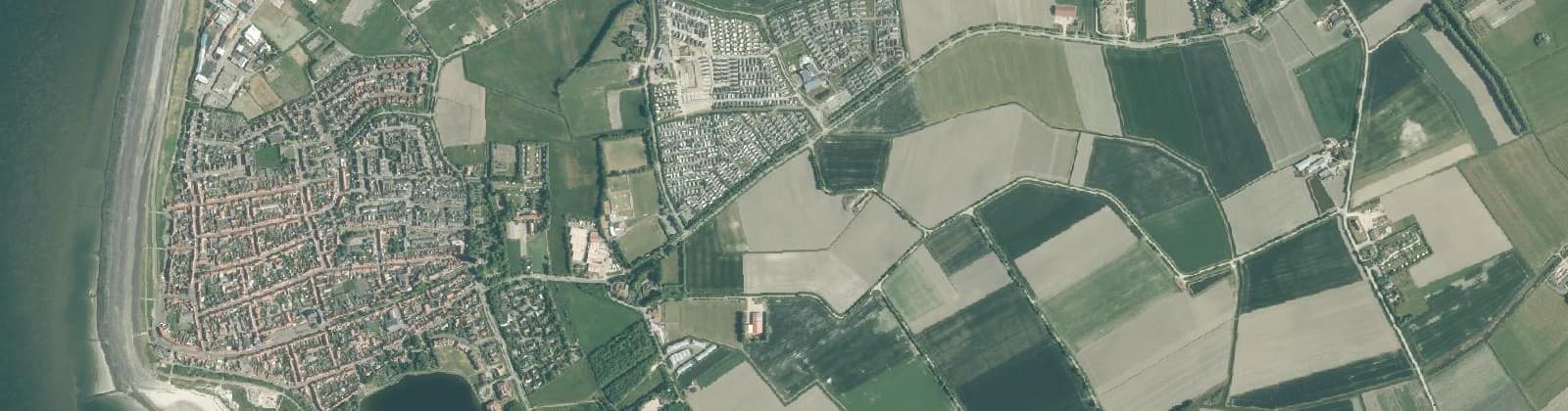 Luchtfoto van Verspreide huizen Westkapelle