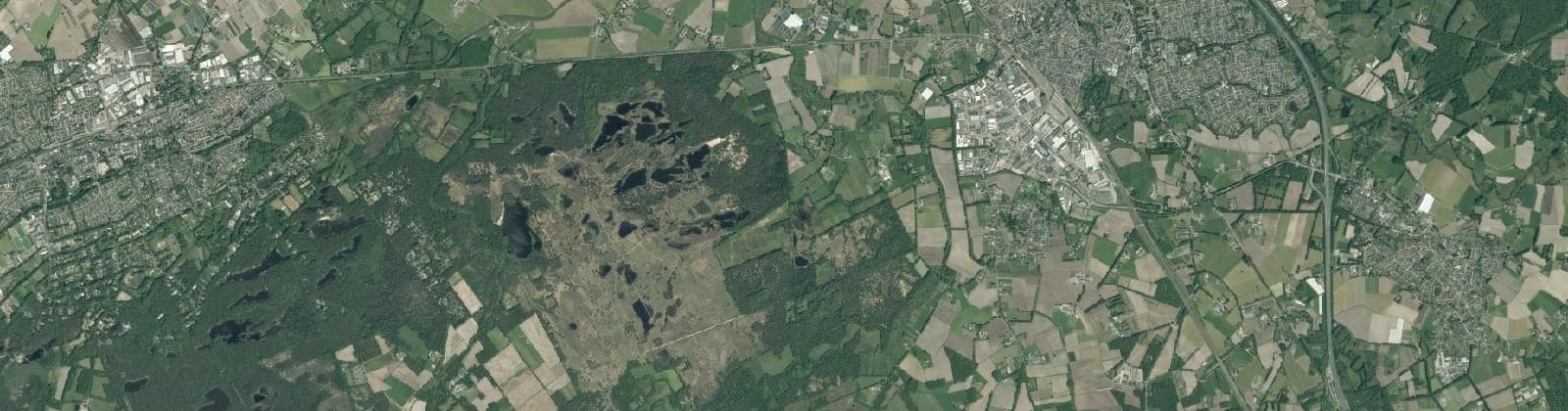 Luchtfoto van Verspreide huizen Roond