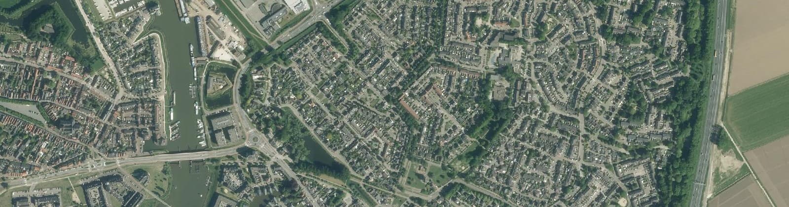 Luchtfoto van Hooipolder en De Hoeven