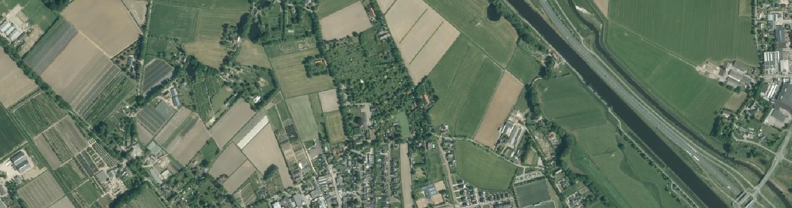 Luchtfoto van Verspreide huizen Poeldonk