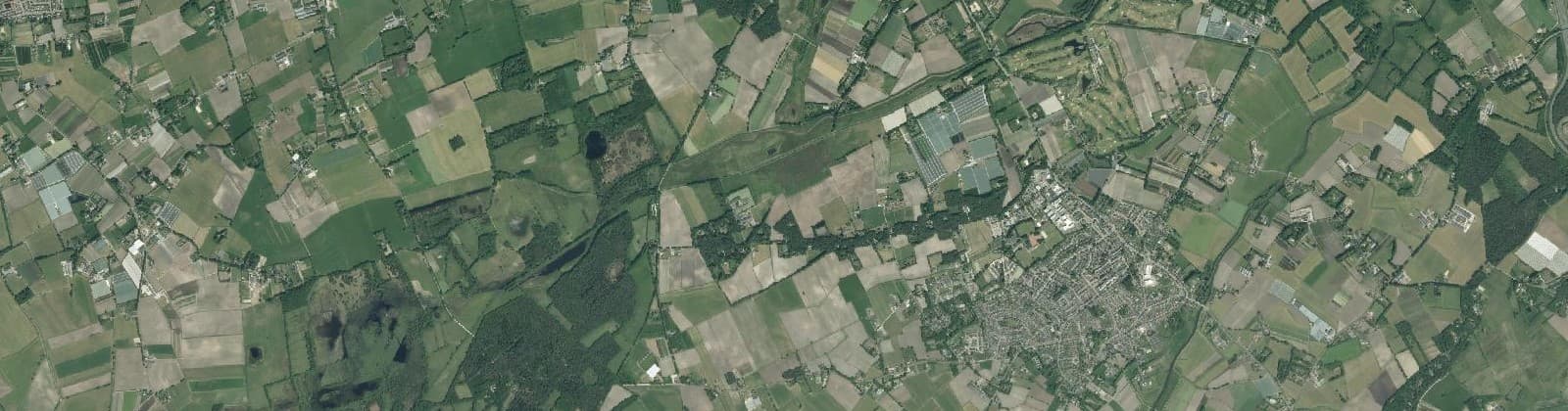 Luchtfoto van Verspreide huizen in het Westen