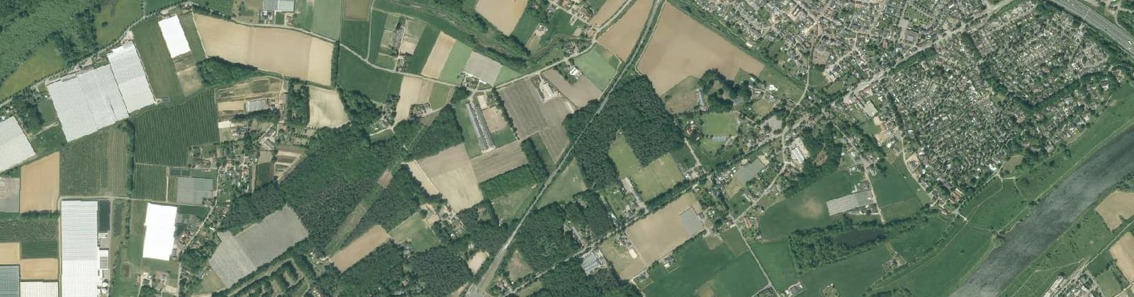 Luchtfoto van Verspreide huizen Hout-Blerick