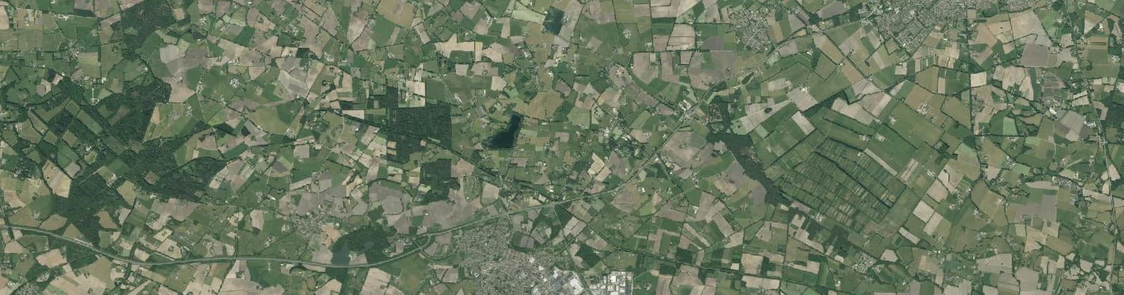 Luchtfoto van Verspreide huizen Heelweg