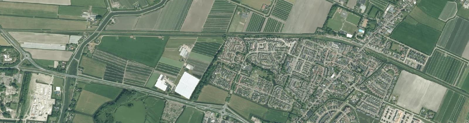Luchtfoto van Obdam Verspreide huizen West