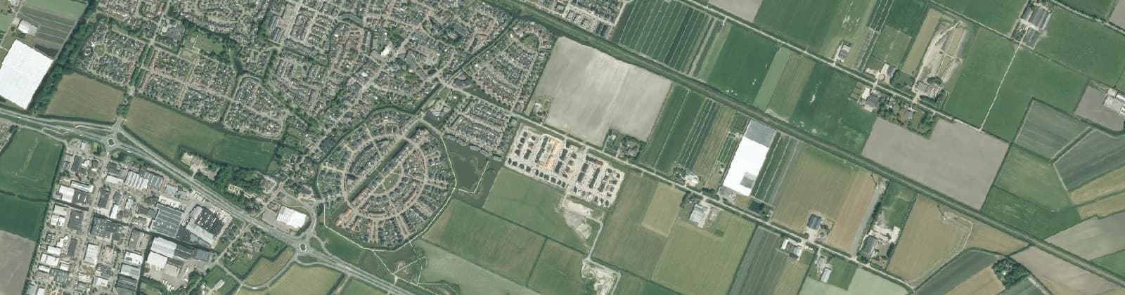 Luchtfoto van Obdam Verspreide huizen Oost