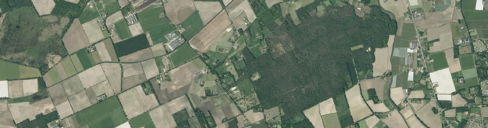 Luchtfoto van Verspreide huizen Heythuysen