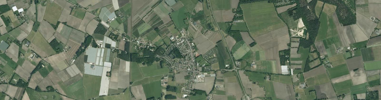 Luchtfoto van Verspreide huizen Nispen