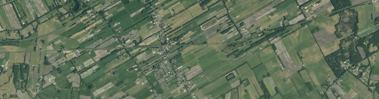 Luchtfoto van Verspreide huizen Koekange