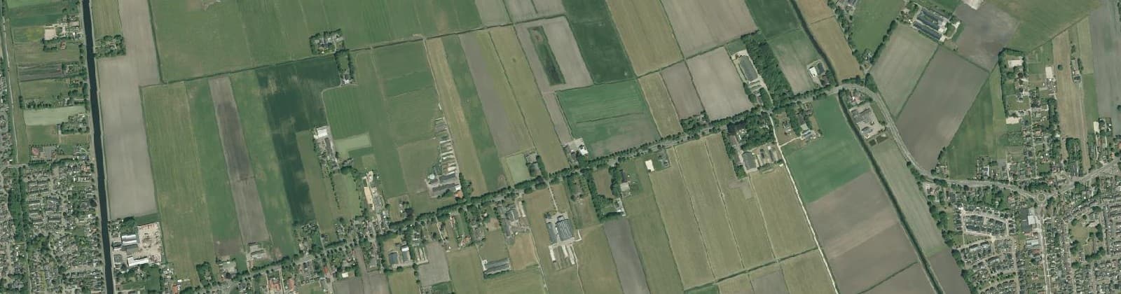 Luchtfoto van Verspreide huizen Vroomshoop-Oost