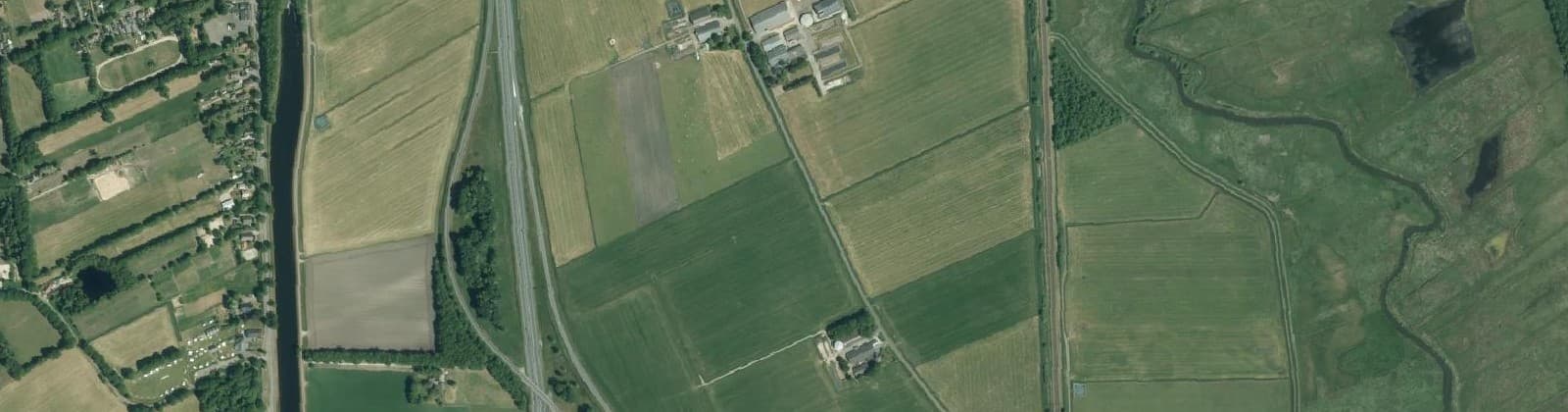 Luchtfoto van Verspreide huizen De Punt