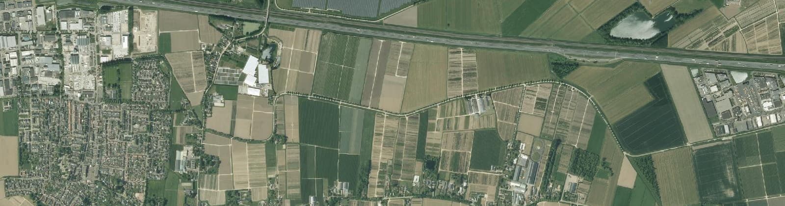 Luchtfoto van Verspreide huizen Dodewaard-Oost en Wely