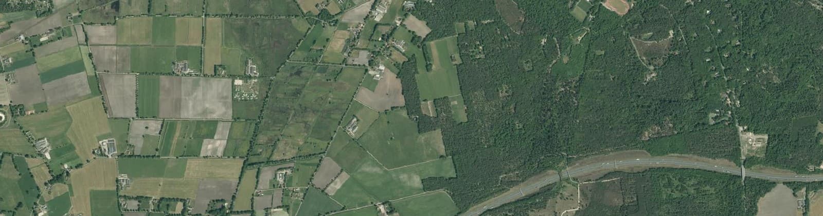 Luchtfoto van Verspreide huizen Zuidrand en omgeving