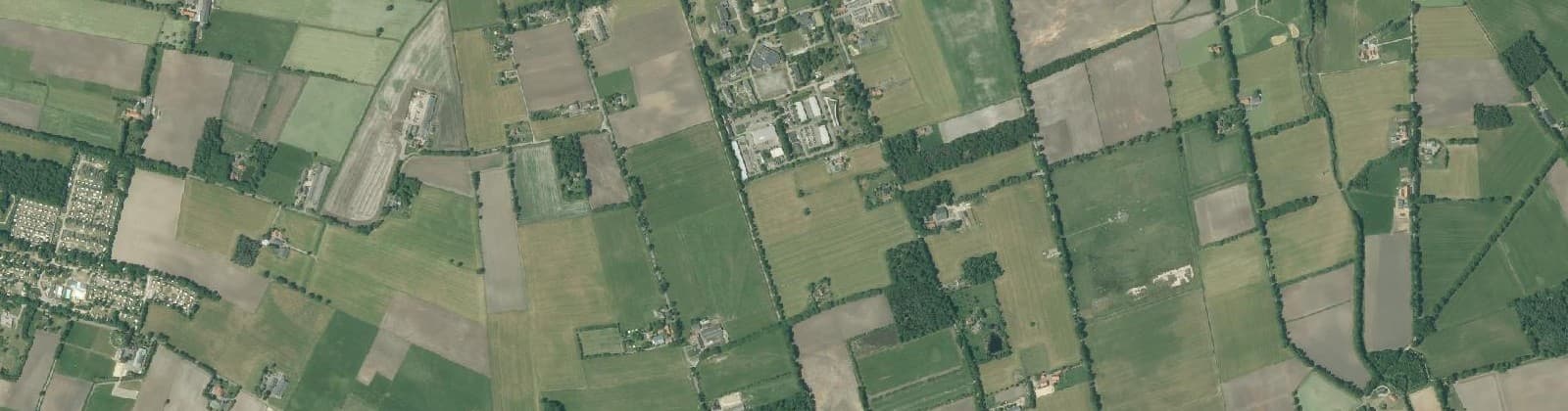Luchtfoto van Verspreide huizen Holterhoek