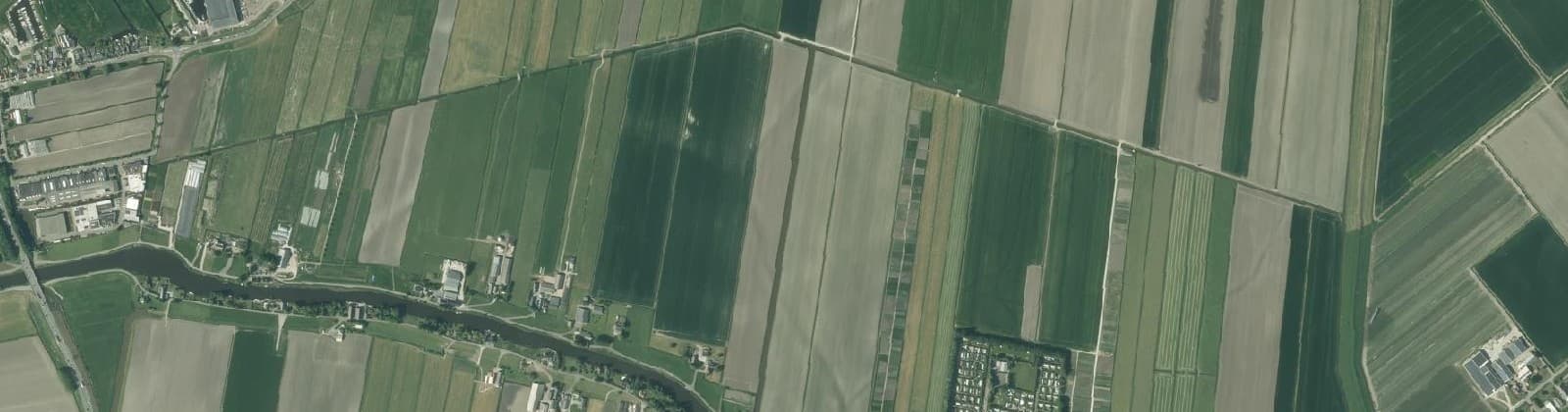 Luchtfoto van Verspreide huizen Vriezekoopse polder