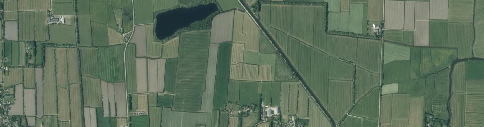 Luchtfoto van Verspreide huizen Driezum