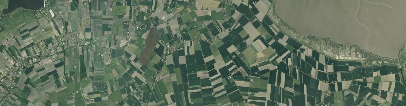 Luchtfoto van Verspreide huizen Nieuwolda
