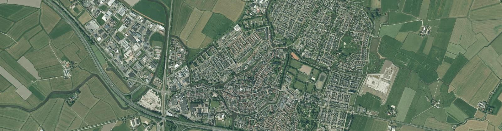 Luchtfoto van Verspreide huizen Bolsward