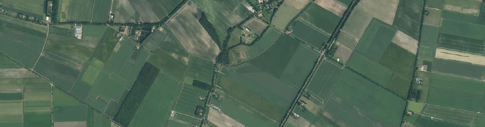 Luchtfoto van Verspreide huizen Ter Wisch