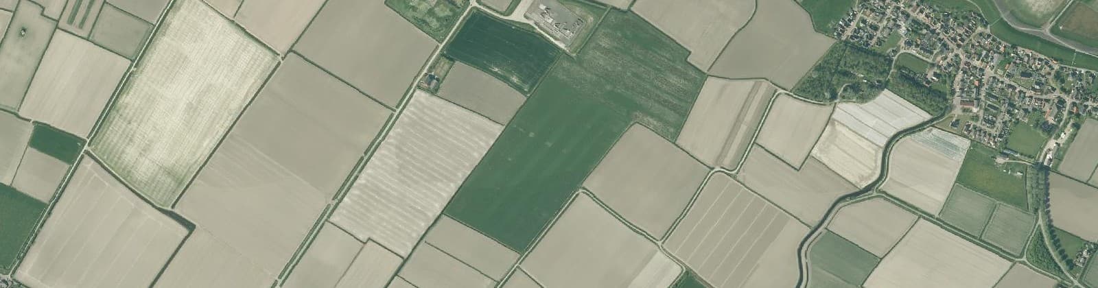 Luchtfoto van Verspreide huizen Moddergat