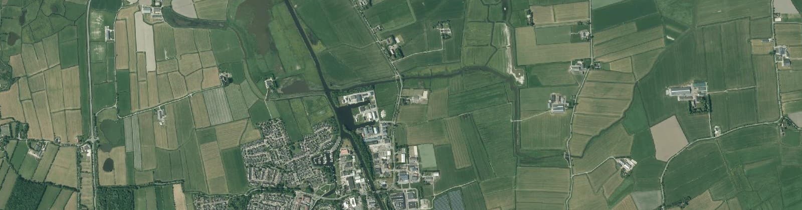 Luchtfoto van Verspreide huizen Kollum