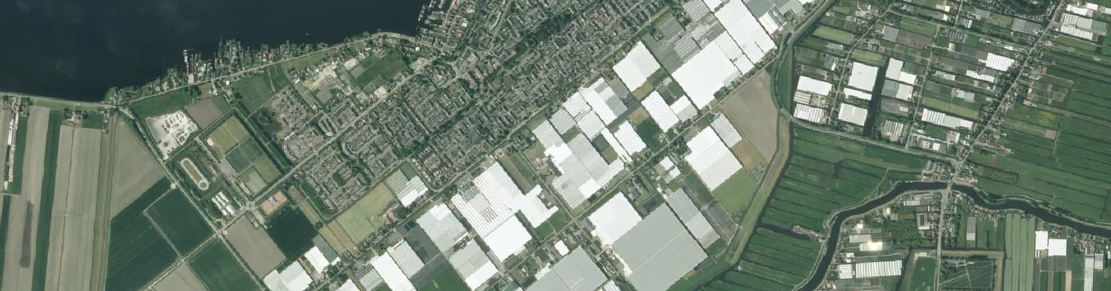 Luchtfoto van Wijk 90 Glastuinbouwgebied