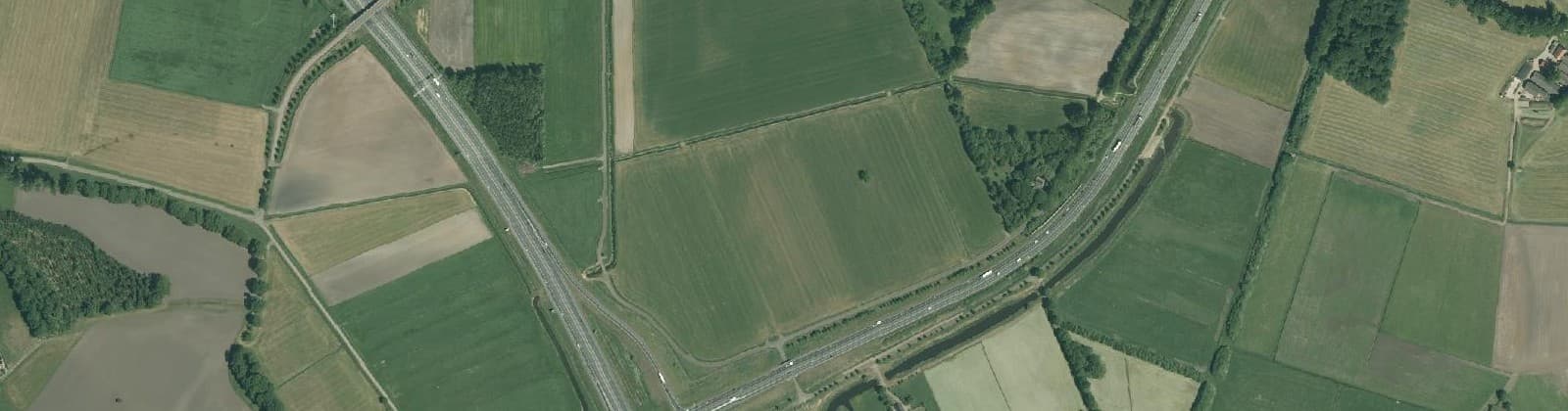 Luchtfoto van Verspreide huizen Broeklanden