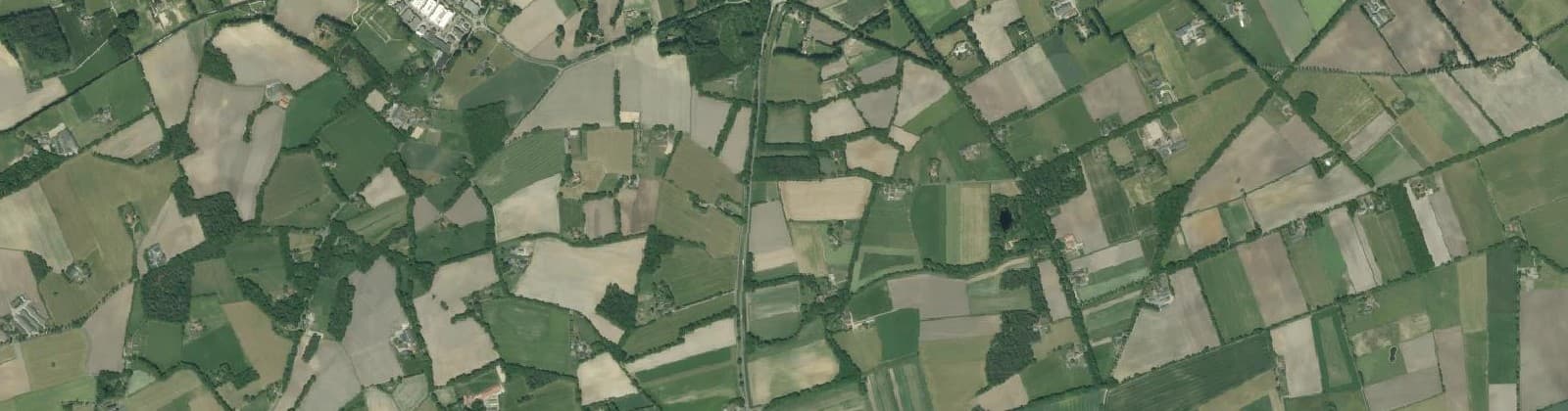Luchtfoto van Verspreide huizen Heurne