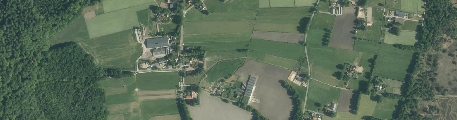 Luchtfoto van Verspreide huizen Speuld