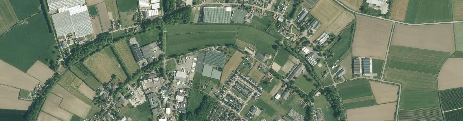 Luchtfoto van Verspreide huizen Uilecoten
