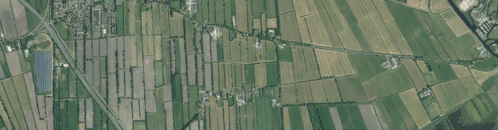 Luchtfoto van Verspreide huizen Sumar