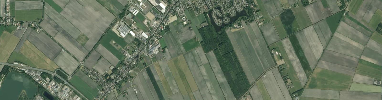 Luchtfoto van Verspreide huizen Oude Pekela
