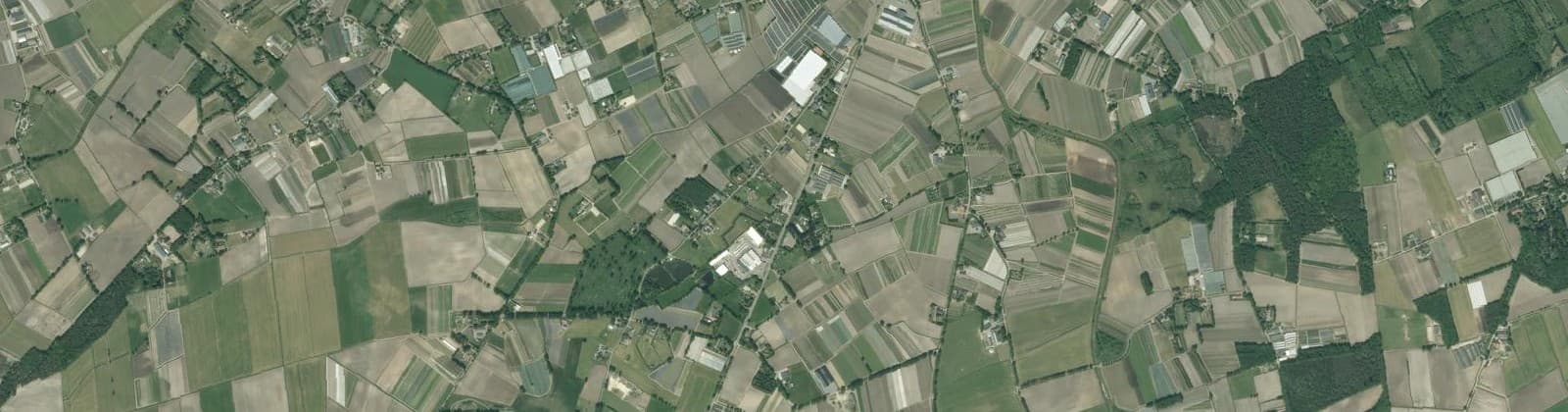 Luchtfoto van Verspreide huizen Wernhout