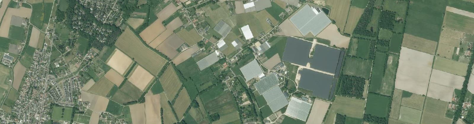 Luchtfoto van Verspreide huizen Velden