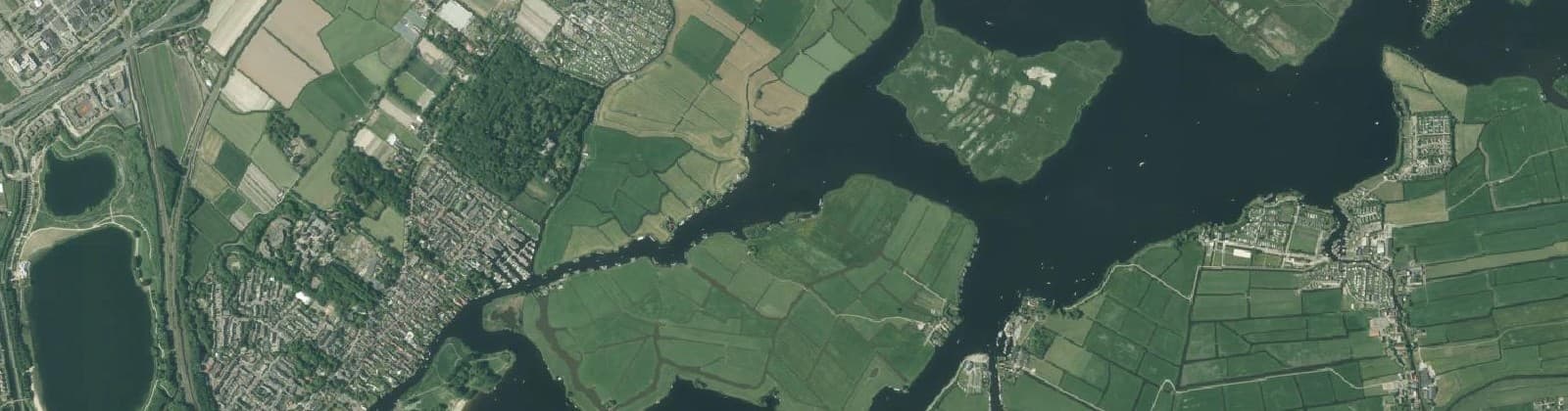 Luchtfoto van Warmond buitengebied-Oosteinde