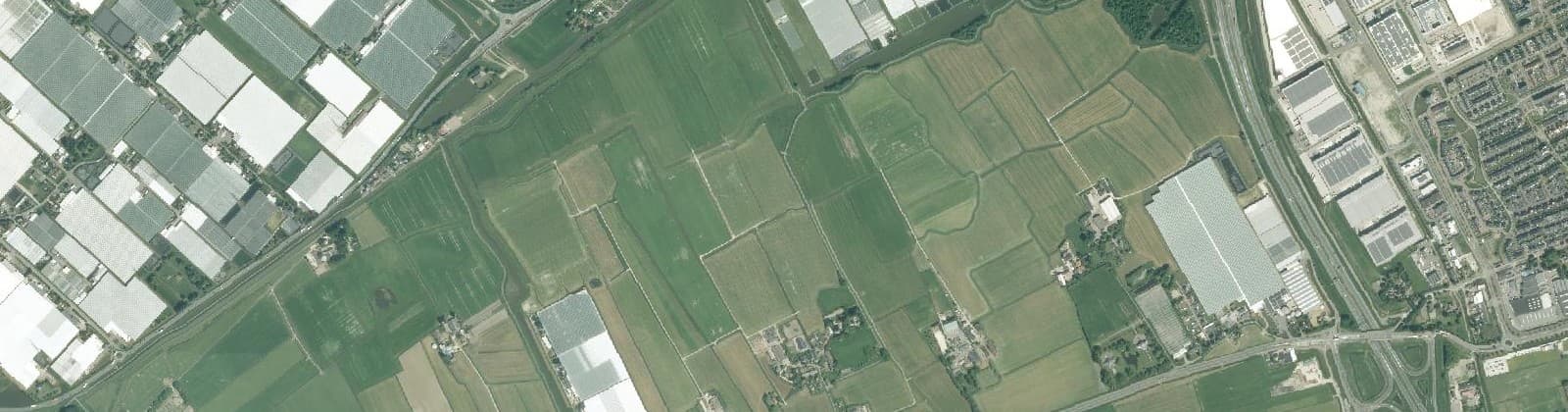 Luchtfoto van Verspreide huizen Schipluiden