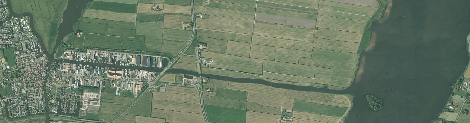 Luchtfoto van Verspreide huizen Koufurderrige