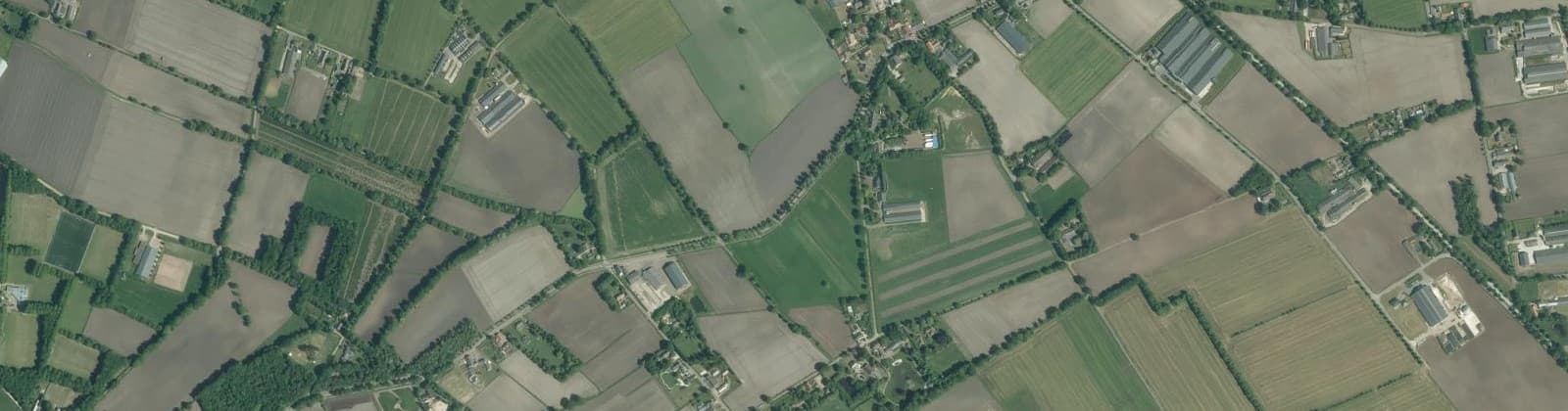 Luchtfoto van Verspreide huizen Trent-Graspeel